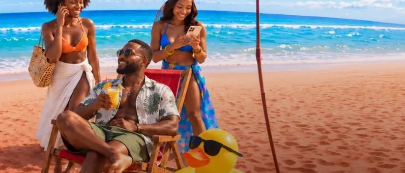 Friends enjoying the beach with Comium Summer Magic promo